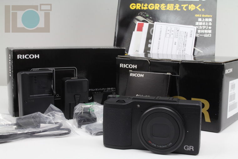 2019年04月22日に一心堂が買取したRICOH GR II ＆ バッテリーチャージャー BJ-6 ＆ オリジナルリング ＆ ムック本の画像